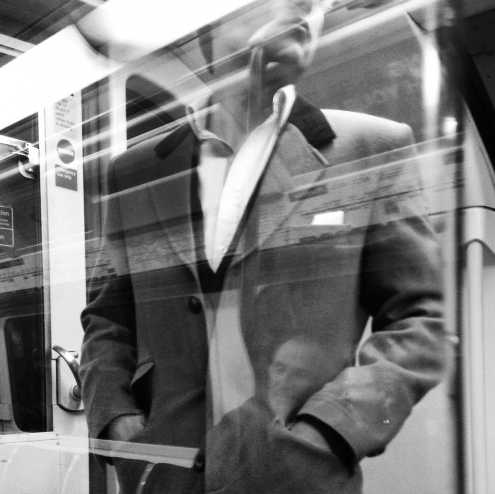 Black and white iPhone photos taken on the London Underground.